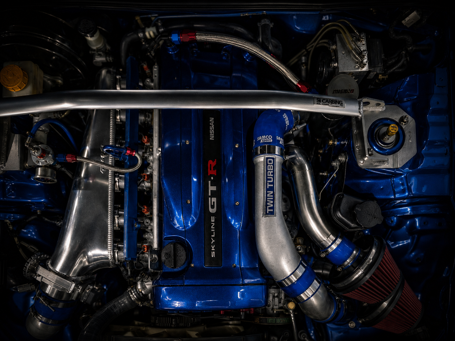 Blue RB26 engine bay in a Nissan Skyline GT-R R34