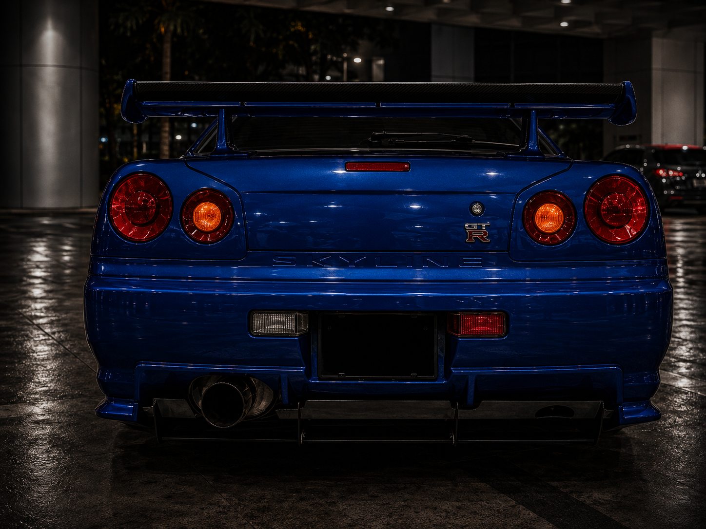 Rear of blue Nissan Skyline GT-R R34